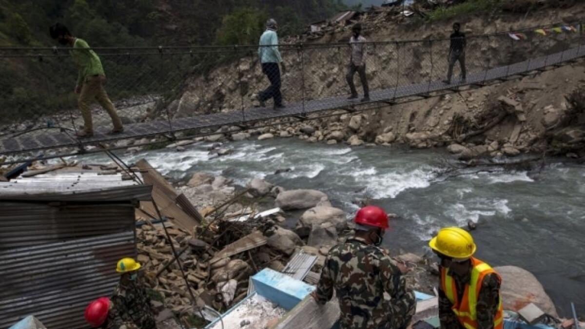 Flash floods kill scores in Nepal, India