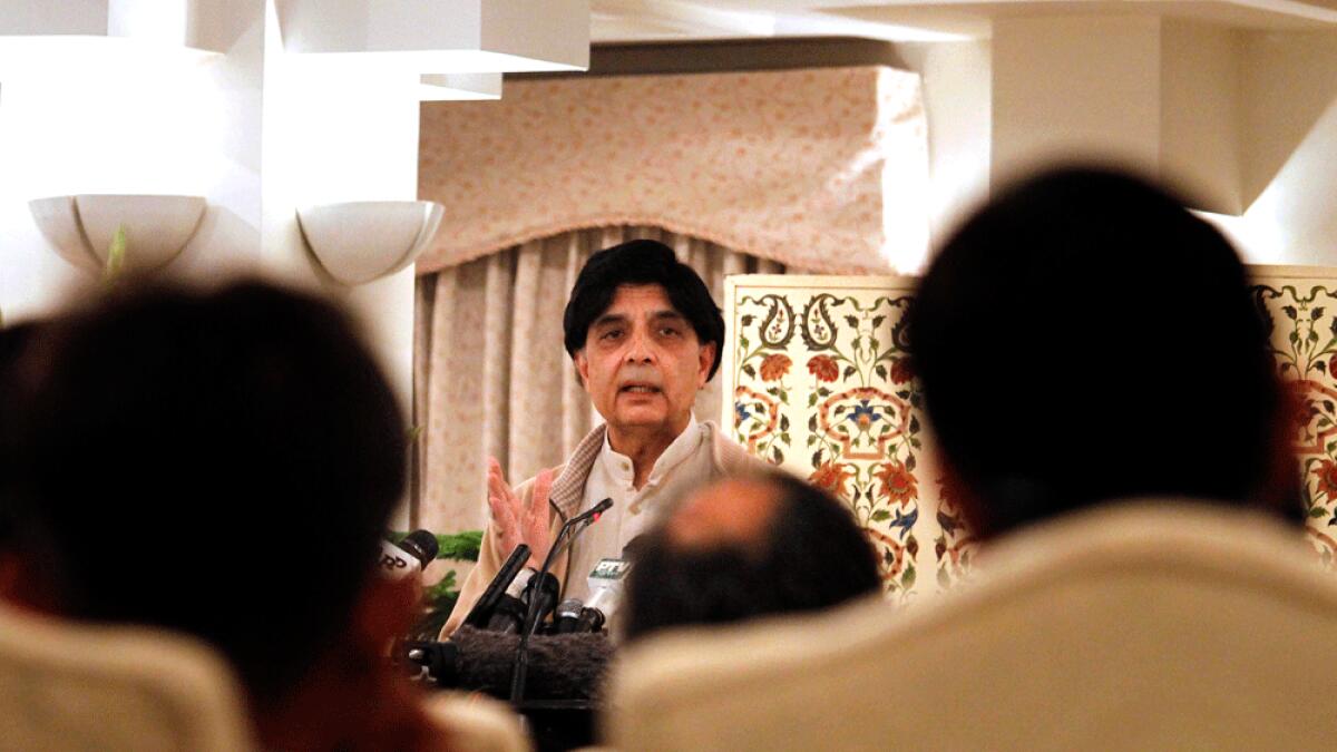 Pakistan Interior Minister Chaudhry Nisar Ali Khan speaks during a press conference in Islamabad.