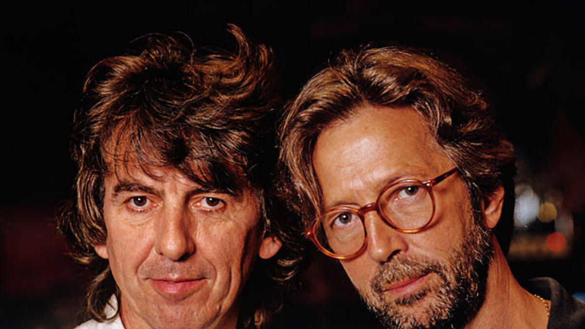 With best friend Eric Clapton, 1991. Clapton and Harrison often collaborated and met at Kinfauns. This friendship is symbolised in 'Lucy' the red Les Paul guitar Clapton gifted him in 1968.
