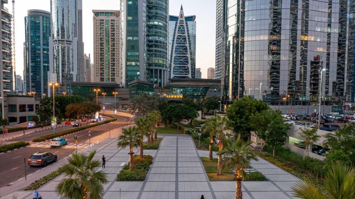 Towers in Dubai. Developers are fast-tracking future developments across a range of free zone and non-free zone locations, commercial real estate services firm said. — File photo