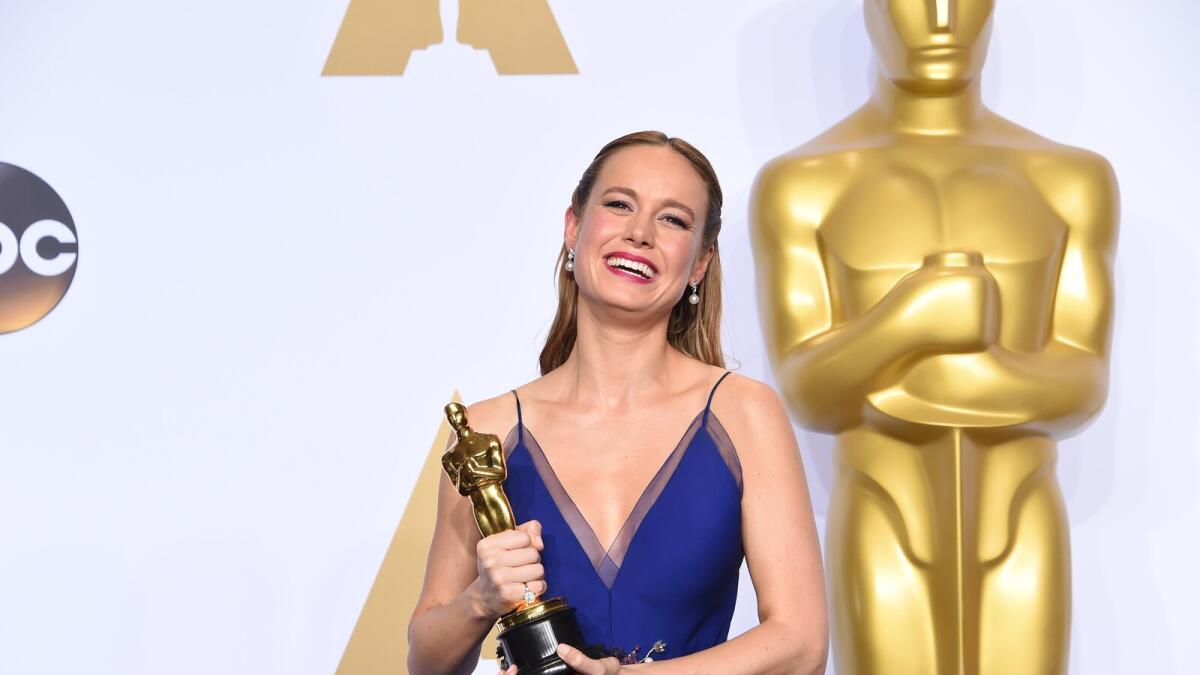 An excited Brie Larson with her Oscar