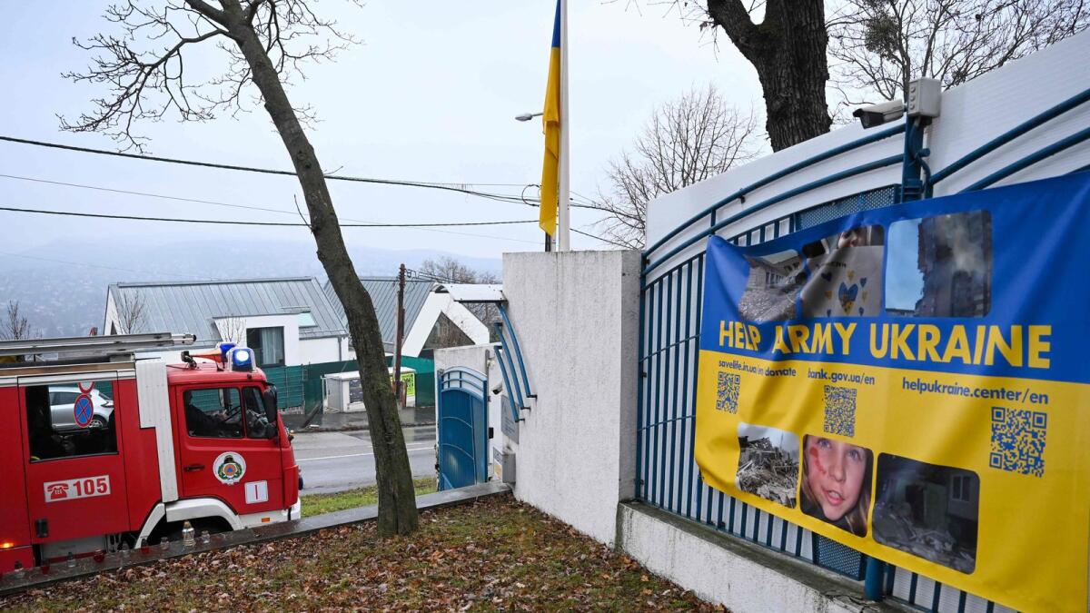 A local fire engine is seen in front of Ukraine's embassy in Budapest on Friday after a bloody package containing animal eyes was received. — AFP