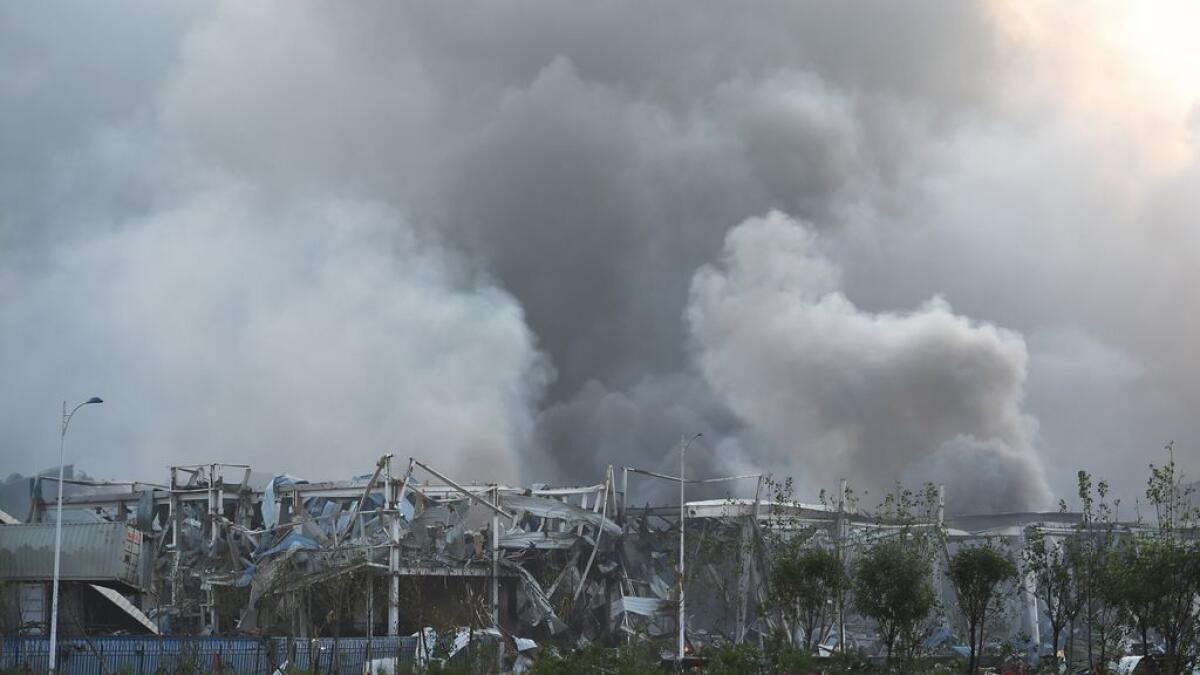 Smoke billows from the site of an explosion in Tianjin, in northern China, on August 13, 2015. 