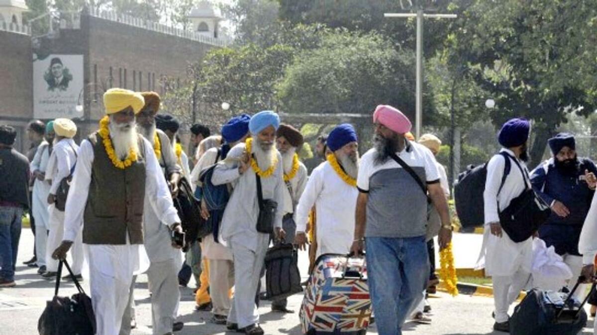 Sikh pilgrims arrive at Wagah Border to celebrate Baisakhi festival. — APP