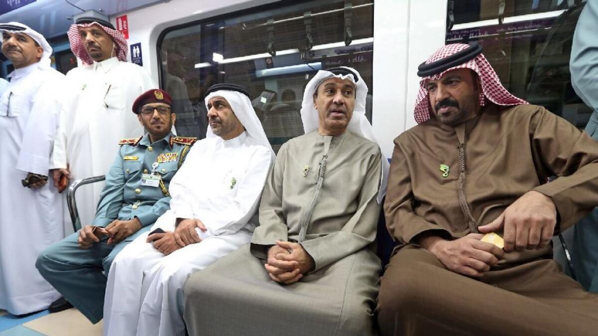 Eng. Hussain Nasser Lootah, Director General, Dubai Municipality and Major General Mohamed Ahmed Al Marri, Director of DNRD along with other Dubai Municipality Officials rides the Dubai Metro as part of the Car Free Day in Dubai on Sunday, February 05, 2017. Photo by Dhes Handumon
