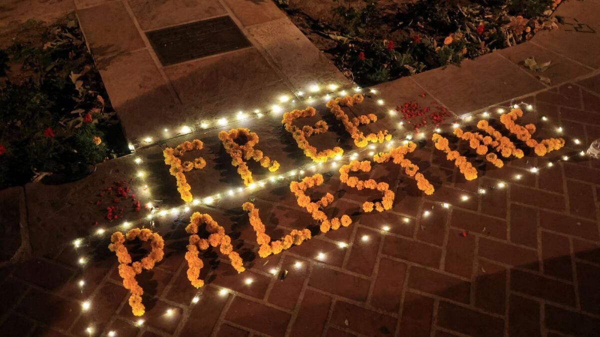 A flower arrangement that reads 'Free Palestine' is placed on the ground during a protest in support of Palestinians in Gaza at the University of Southern California (USC), in Los Angeles. — Reuters