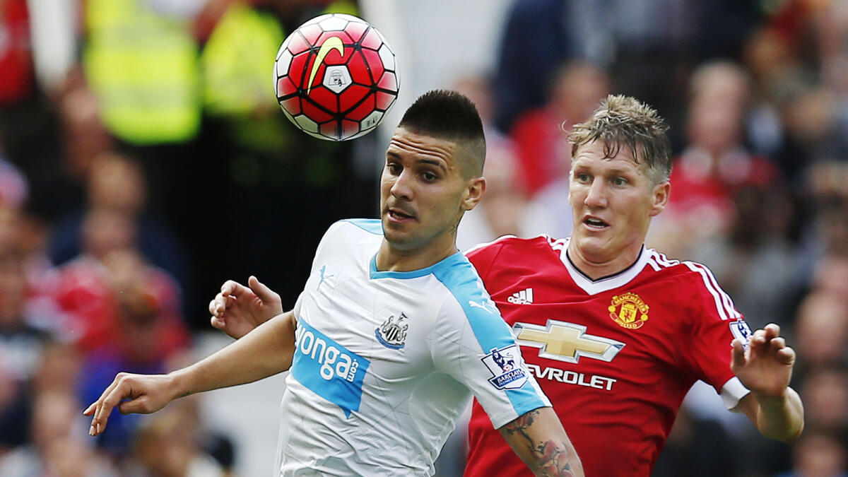 Football - Manchester United v Newcastle United - Barclays Premier League - Old Trafford - 22/8/15Newcastle's Aleksandar Mitrovic in action with Manchester United's Bastian SchweinsteigerReuters / Andrew YatesLivepicEDITORIAL USE ONLY. No use with unauthorized audio, video, data, fixture lists, club/league logos or 'live' services. Online in-match use limited to 45 images, no video emulation. No use in betting, games or single club/league/player publications.  Please contact your account representative for further details.