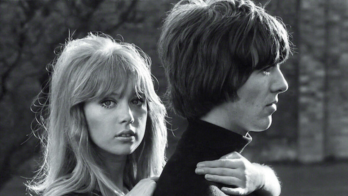 Harrison's first marriage was with English model Pattie Boyd. This 1965 photo shows the couple in Kinfauns - the couple's home where most of the White Album was recorded.