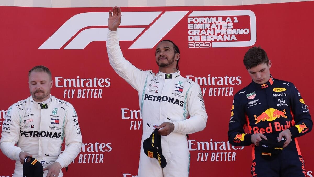Hamilton rules in Spain to seize championship lead from Bottas