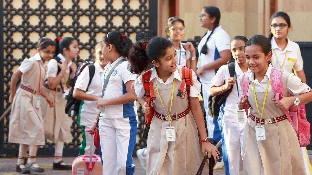 Indian High School Dubai students arrive at school on the first day after reopening. - Photo by Shihab