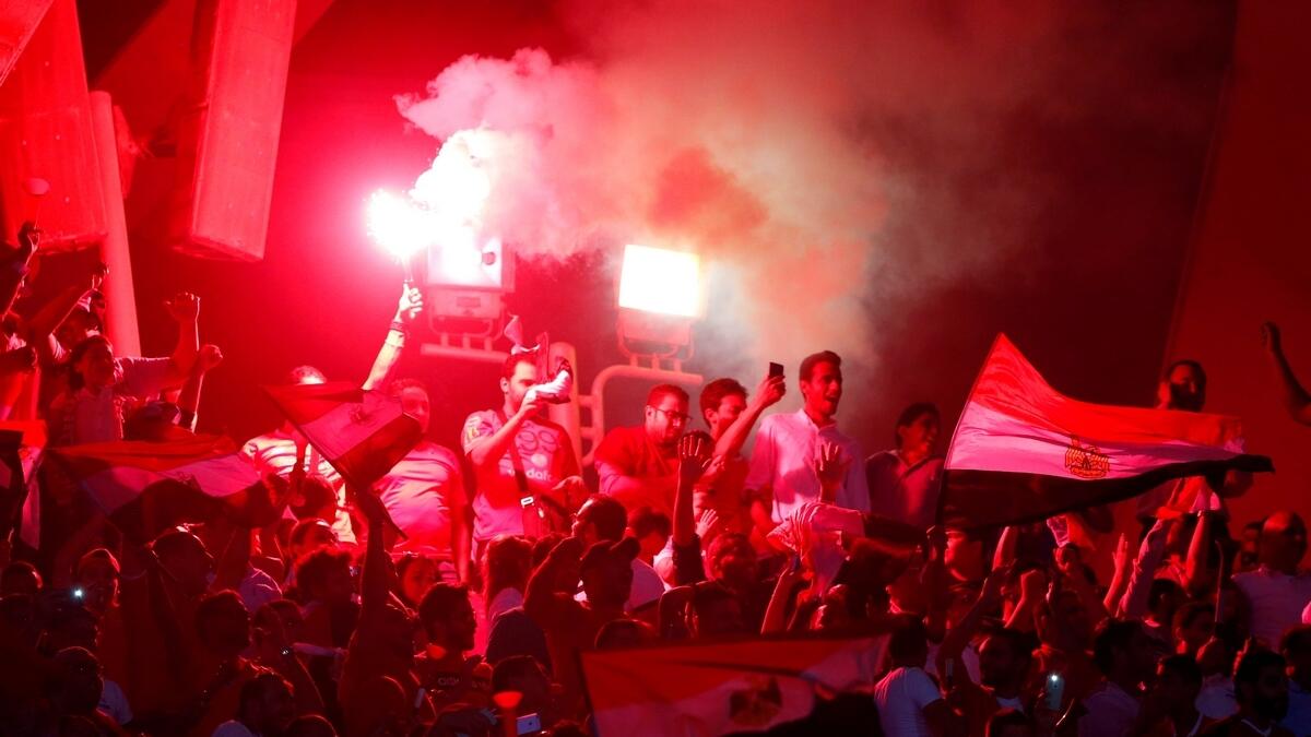 Egyptians celebrate their victory in a soccer match against Congo that qualifies Egypt for the World Cup, in Cairo, Egypt October 8, 2017.