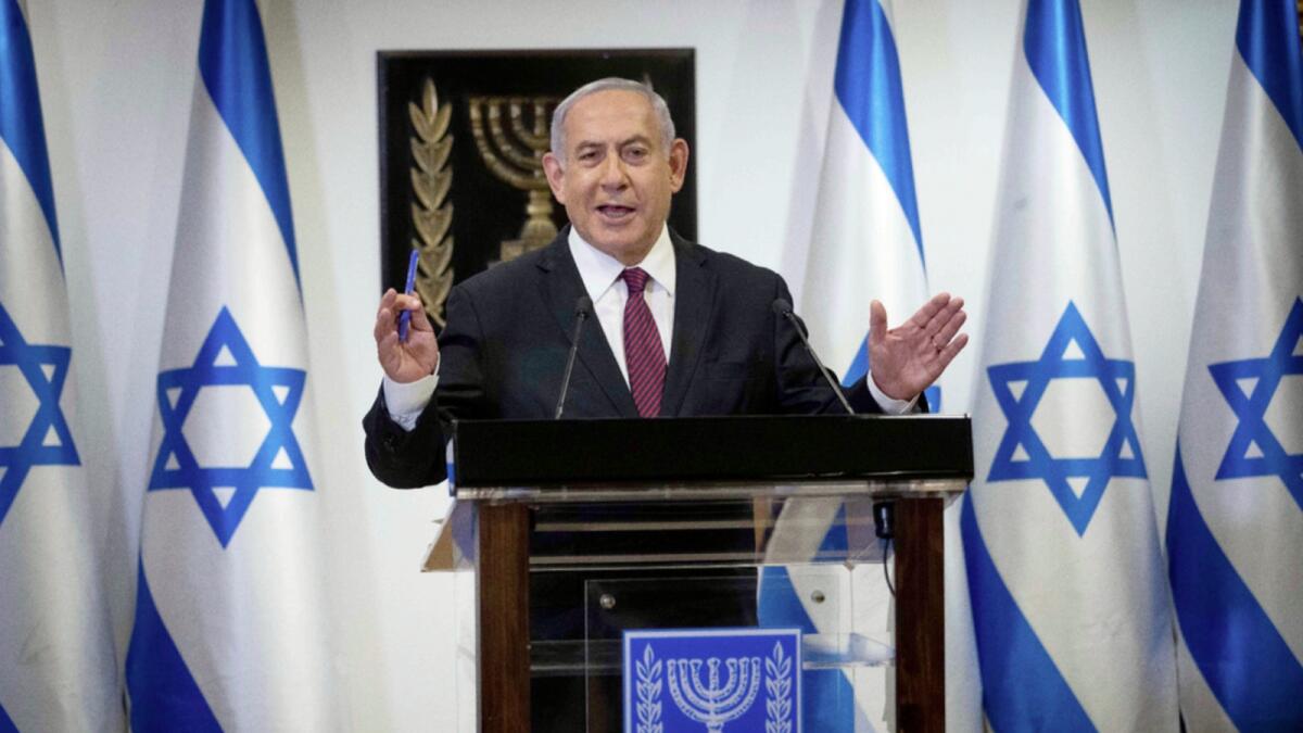 Israeli Prime Minister Benjamin Netanyahu delivers a statement at the Israeli Parliament, in Jerusalem. — AP