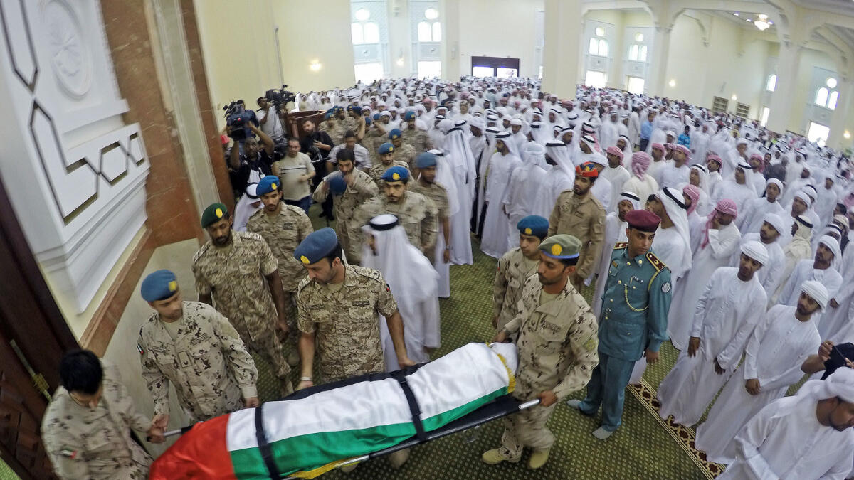 Body of martyr Mohammed Obaid Salem Al Hammudi from Diba Al Hisn in Sharjah being taken for the burial ceremony after the funeral prayer. — Photo by M.Sajjad