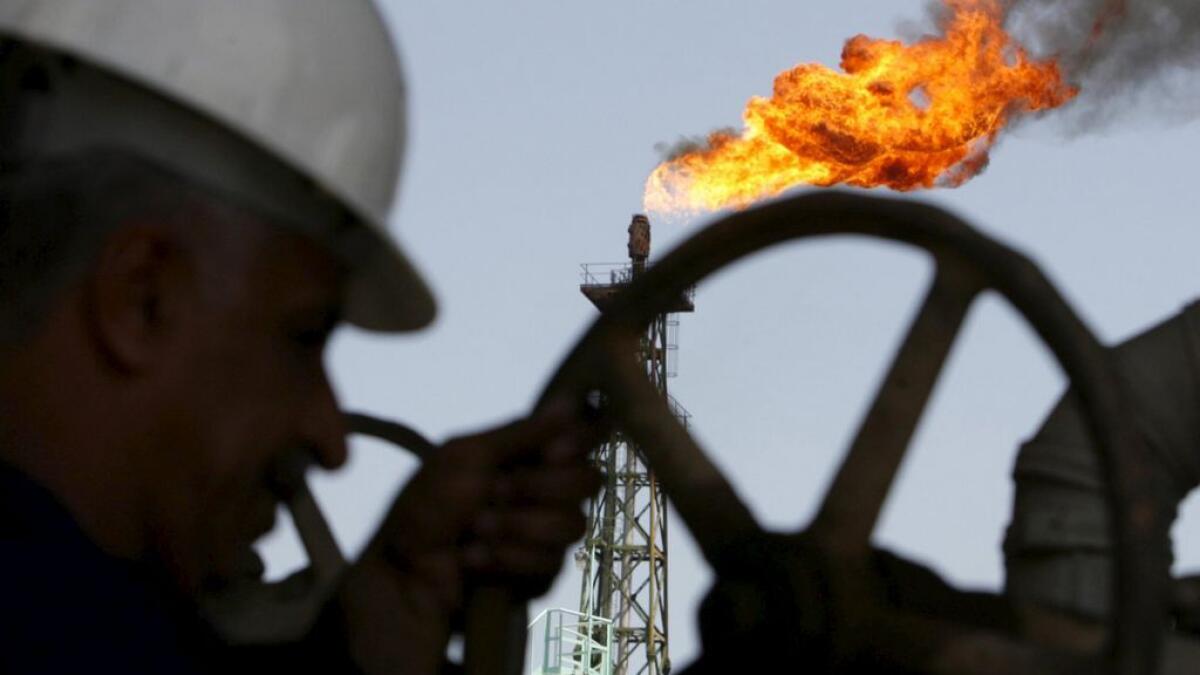 Oil slides below $33 to near 12-year low as China turmoil rattles investors     