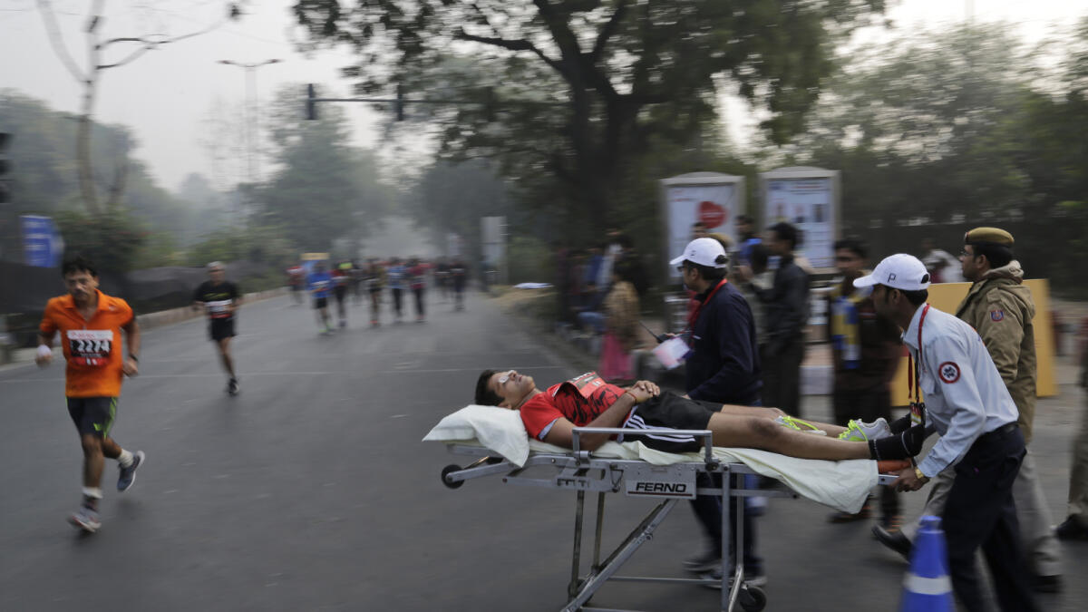New Delhi marathon runners brave hazardous pollution