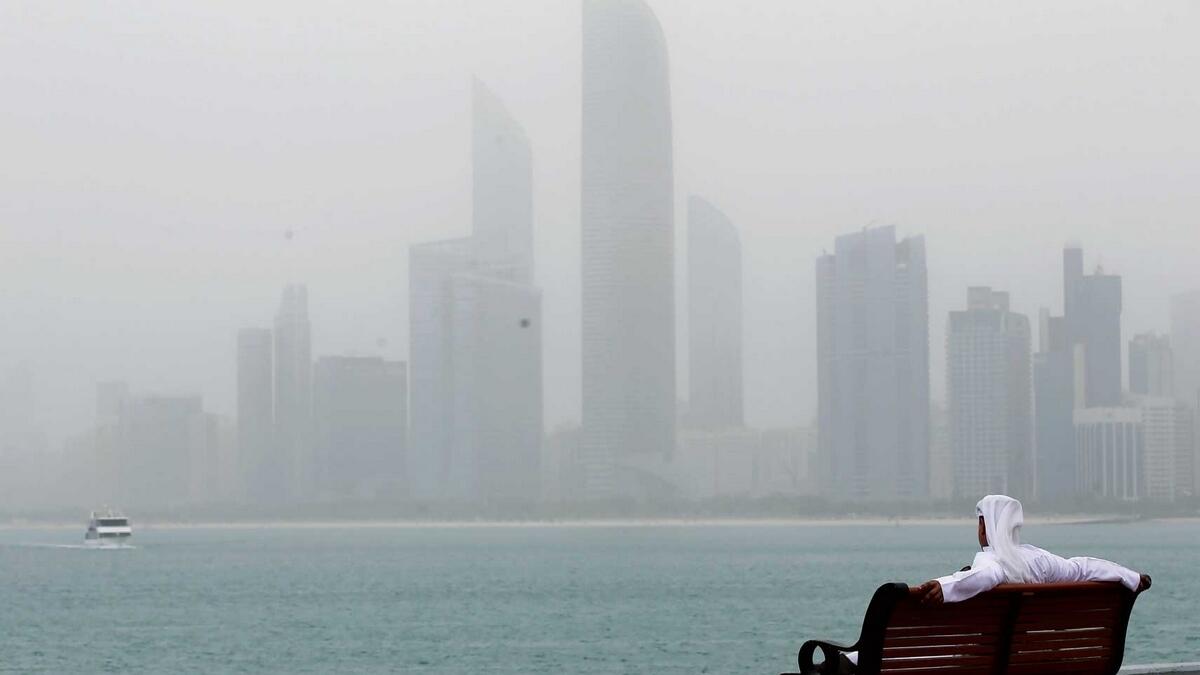 Dusty weather covers the skyline of Abu Dhabi 