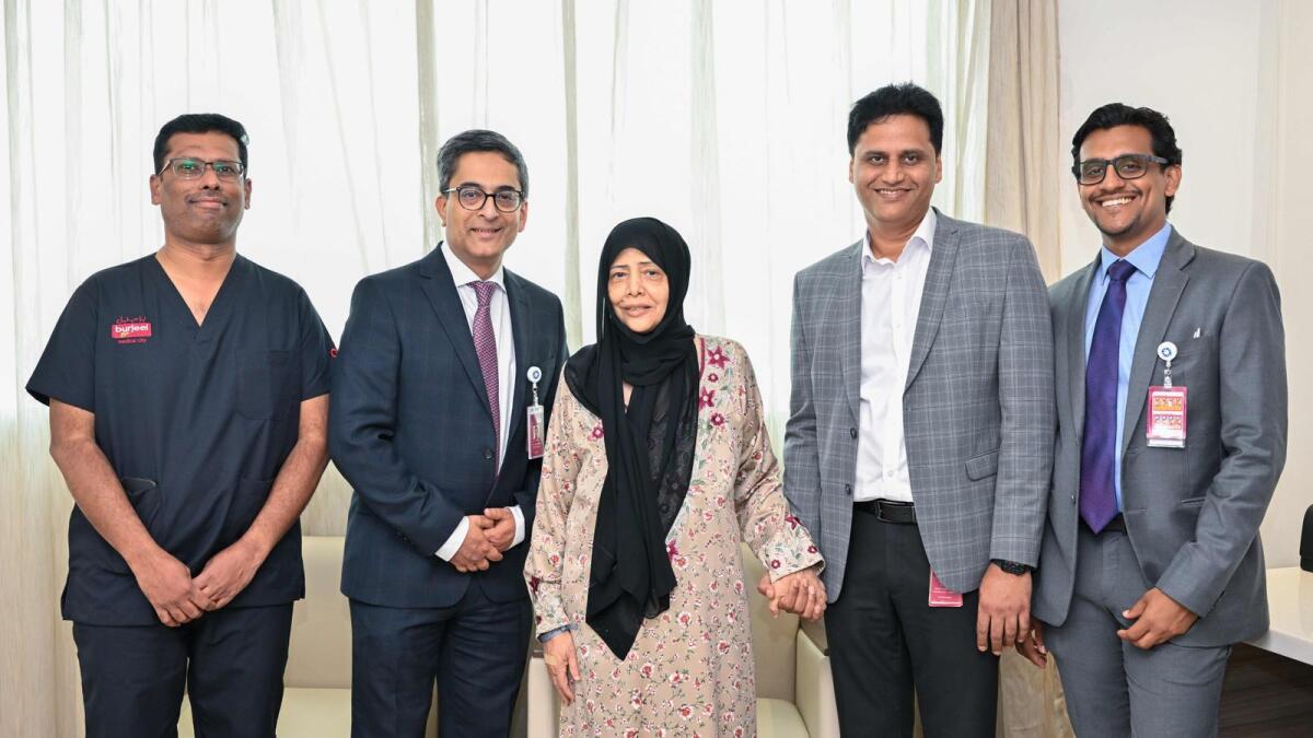 Fatima Ali (centre) with her medical team.— Photo: Supplied