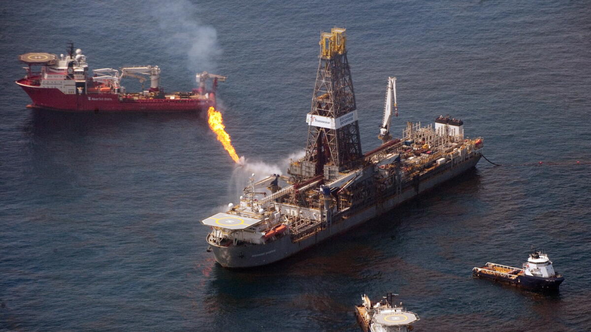 A drill ship collects oil from over the site of the BP Deepwater Horizon oil well off the coast of Louisiana on June 12, 2010.