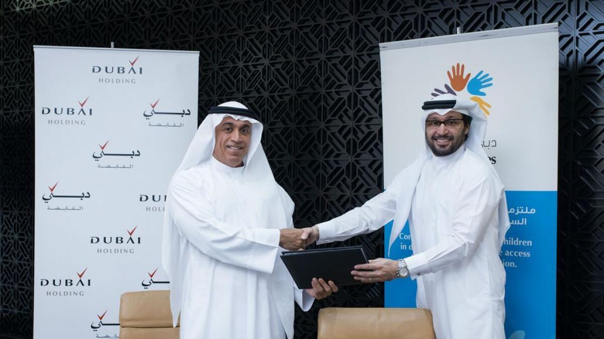 Dubai Cares, Dubai Holding join hands to boost literacy among poor 