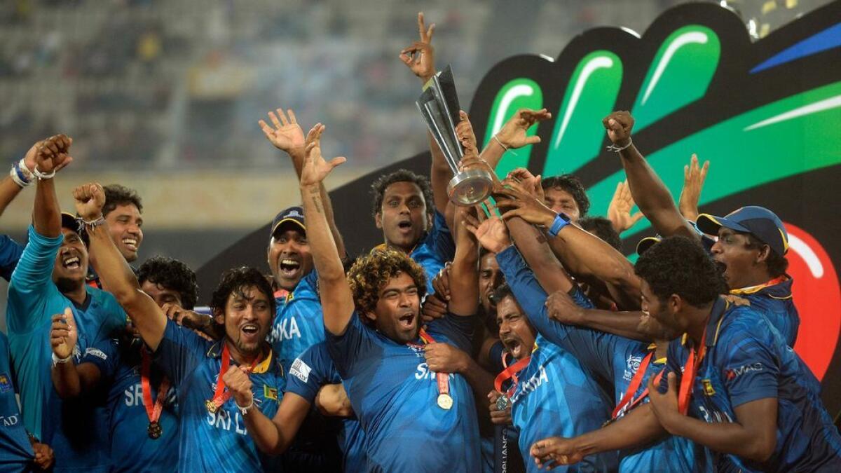 The Sri Lankan team lifts the trophy in the 2014 edition of the T20 World Cup.