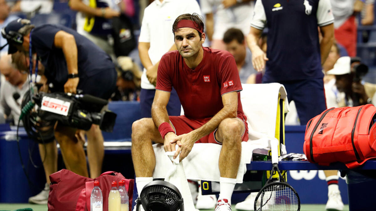 Breathless Federer stunned by Millman