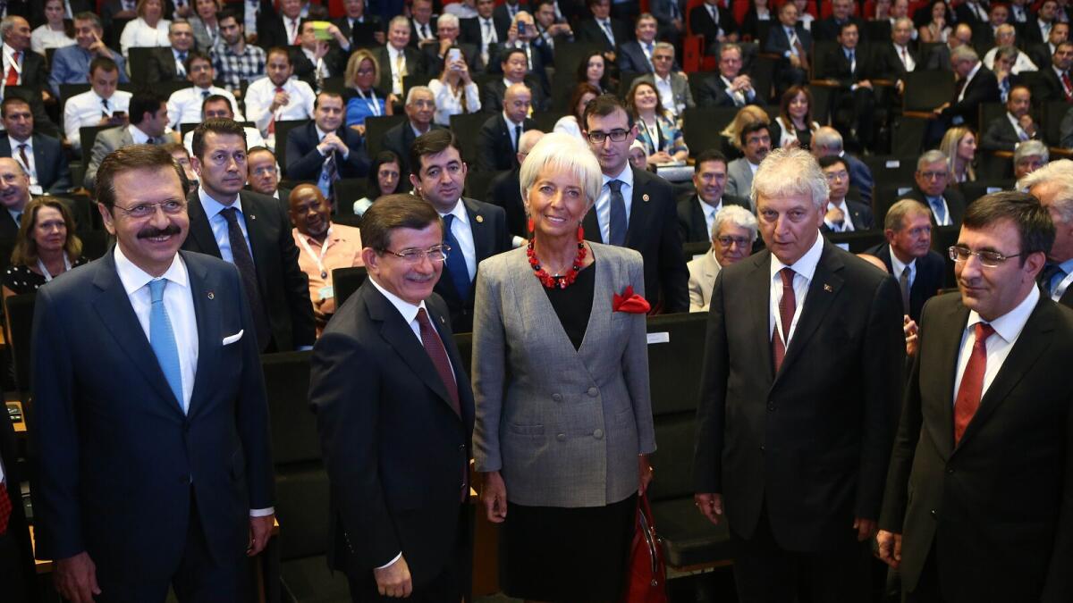 Turkish Prime Minister Ahmet Davutoglu and International Monetary Fund Managing Director Christine Lagarde at the G20 finance ministers meeting in Ankara.
