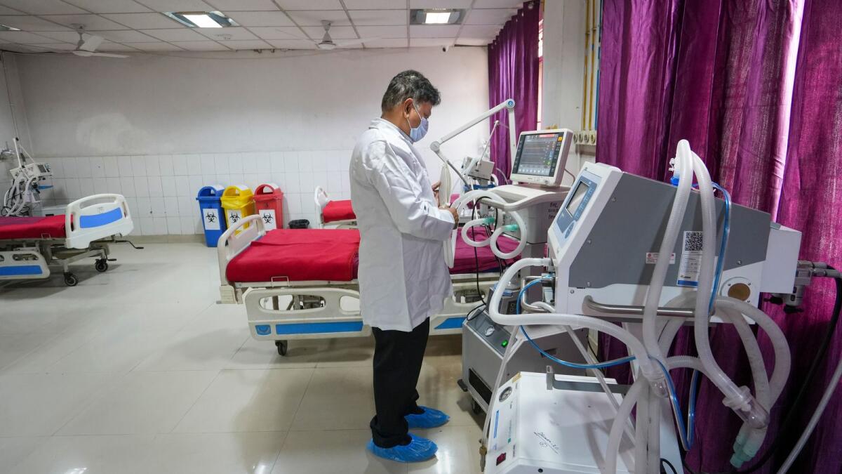 A health worker at an isolation ward for Covid-19 patients at Balrampur hospital during a mock drill for preparedness in Lucknow. — PTI file