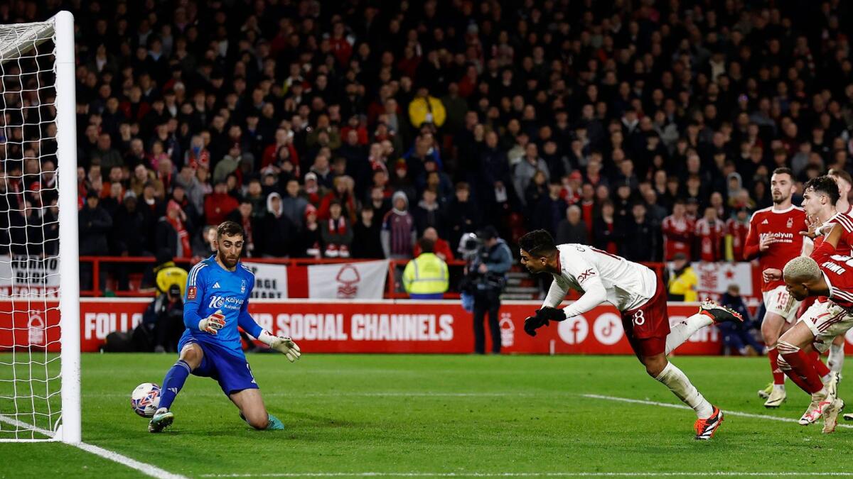 Manchester United's Casemiro scores their first goal past Nottingham Forest's Matt Turner. - Reuters