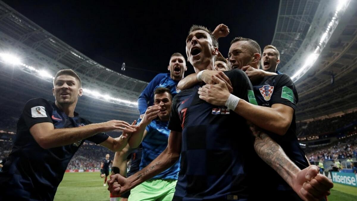 Croatia's Mario Mandzukic celebrates scoring their second goal with teammates against England. Reuters