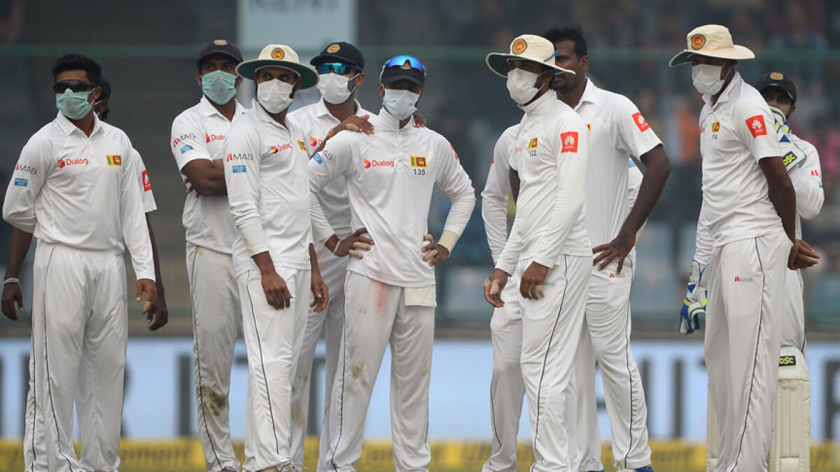 Lankan players sport face masks to counter pollution in Kotla Test