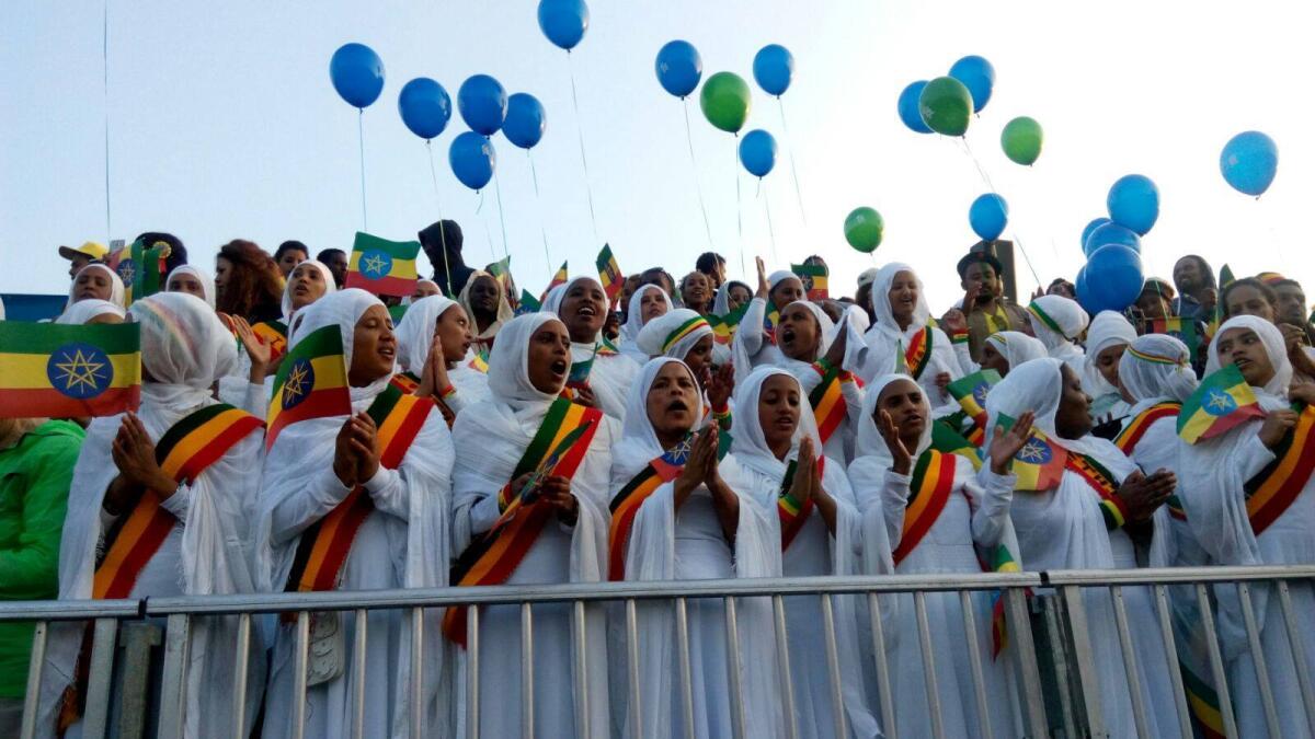 Ethiopians cheer on participants at the Standard Chartered Dubai Marathon 2016- the biggest mass participation sporting event in the Middle East.