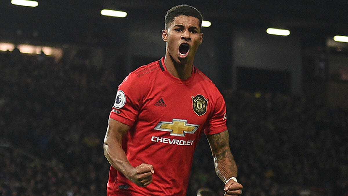Manchester Unted's player Marcus Rashford had written a long letter to the UK government. -- AFP