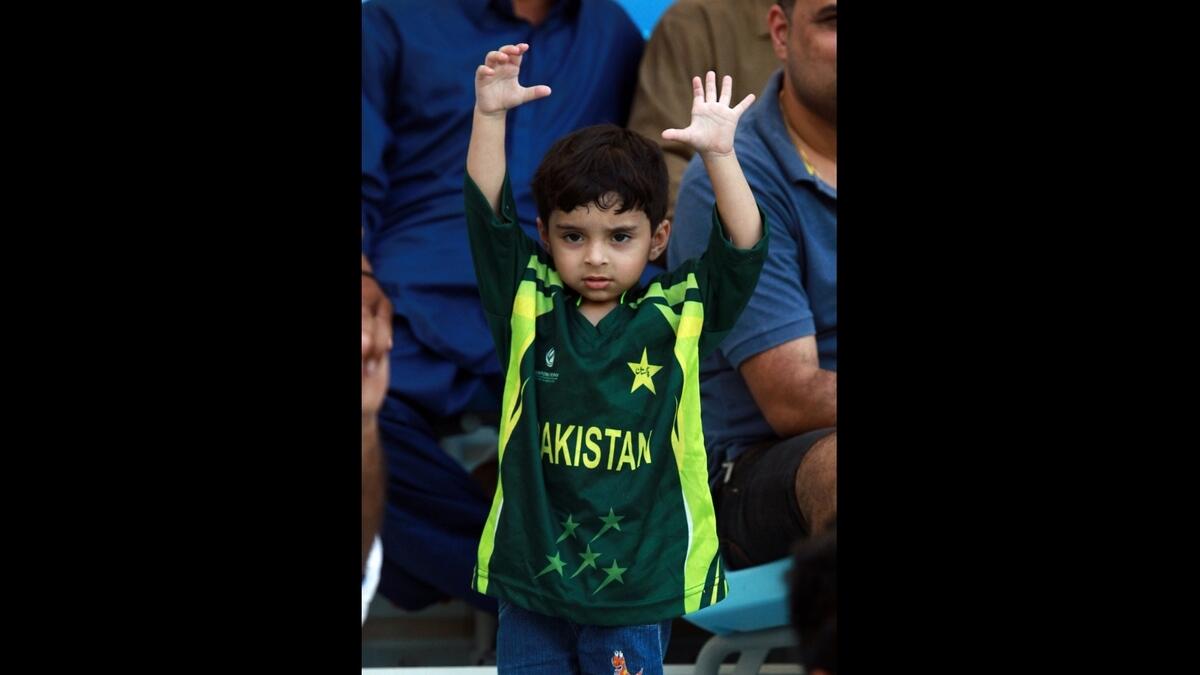Pakistan fan enjoys Test match against Sri Lanka at Dubai Cricket Stadium. Photo by Shihab/KT
