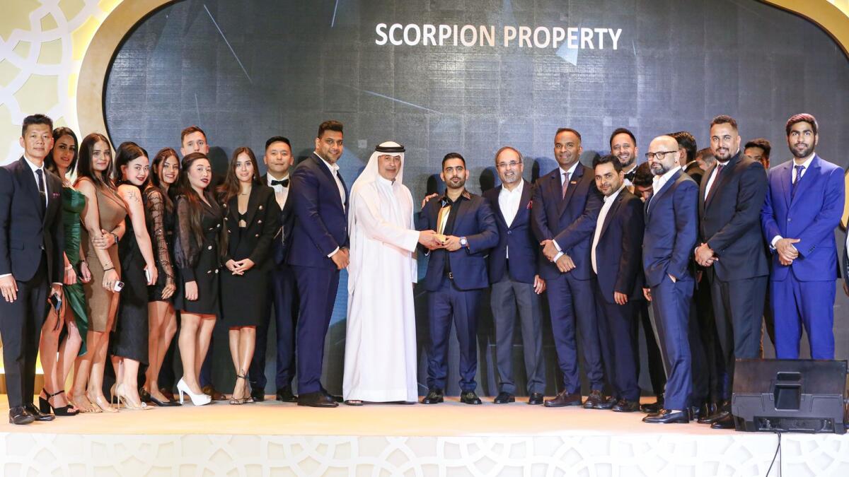 Neeraj Mishra, CEO, Scorpion Property receiving the award from Ahmad Al Matrooshi, Executive Board Member, Emaar and Amit Jain, Group CEO, Emaar