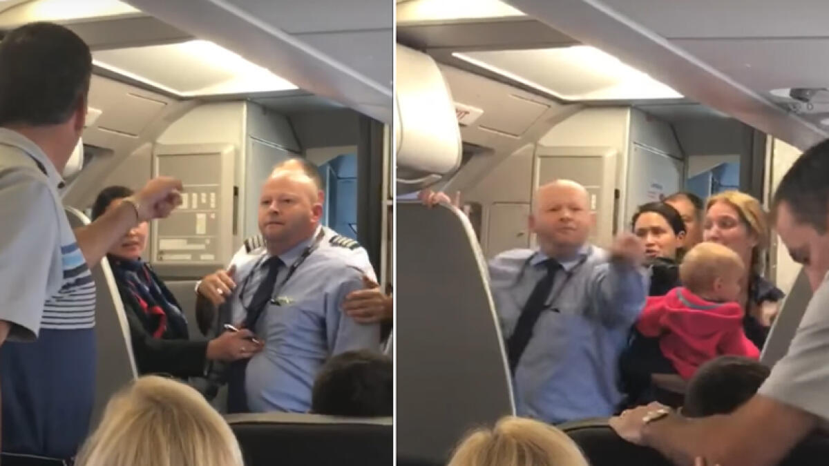 Airline employee challenges passenger to a fight