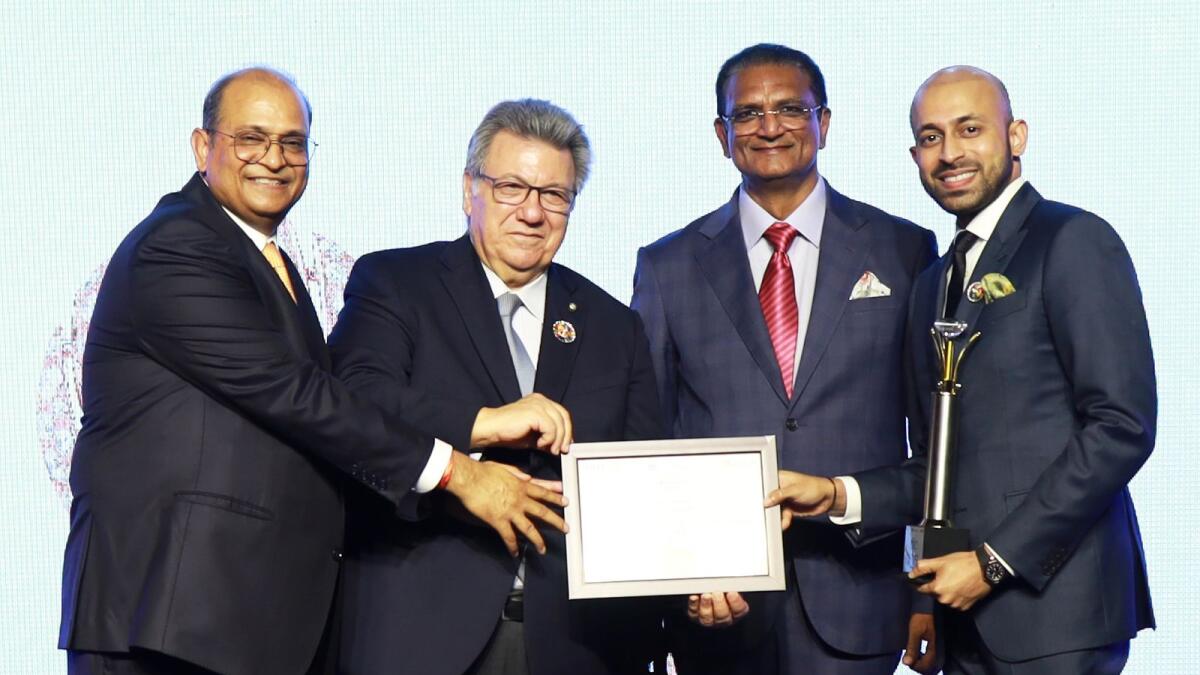 John Paul Alukkas, managing director of Joyalukkas Group receiving the award on behalf of Joy Alukkas, chairman and managing director of Joyalukkas Group by the World Jewellery Confederation for his outstanding contributions. Dr Gaetano Cavalieri, president, World Jewellery Confederation (CIBJO), Pramod Agrawal, vice president, World Jewellery Confederation (CIBJO), chairman, National Gems &amp; Jewellery Council of India, and Vipul Shah, chairman, GJEPC are also seen.