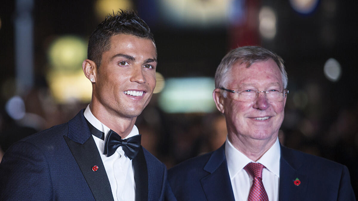 Alex Ferguson and Cristiano Ronaldo (left) at the world premiere of the film Ronaldo in central London on November 9, 2015. -- AFP file