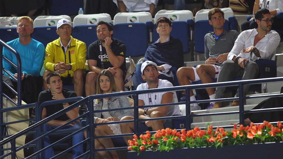 Former tennis player Boris Becker (extreme left) along with other spectators watch the match between Novak Djokovic and Tommy Robredo to start in the Dubai Duty Free Tennis Championships at Dubai Tennis Stadium on Monday, 22 February 2016. Photo by Kiran Prasad