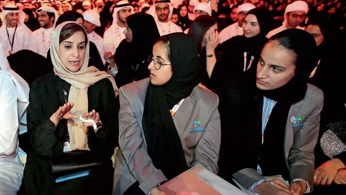 Jameela Salem Al Muhairi, Minister of State for Public Education, is seen with the participants during the opening of the Mohamed Bin Zayed Majlis for Future Generations held at  the Abu Dhabi National Exhibition Centre.-Photo by Ryan Lim