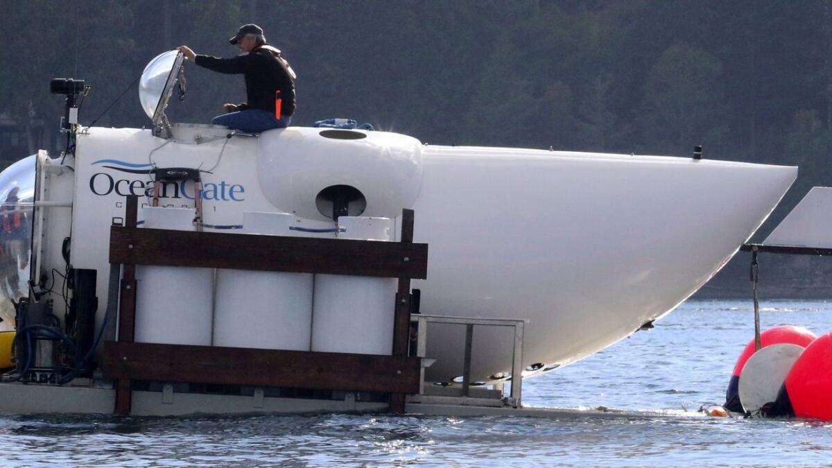 OceanGate CEO Stockton Rush emerges from the hatch atop the OceanGate submarine Cyclops 1 on September 12, 2018. — AP file photo
