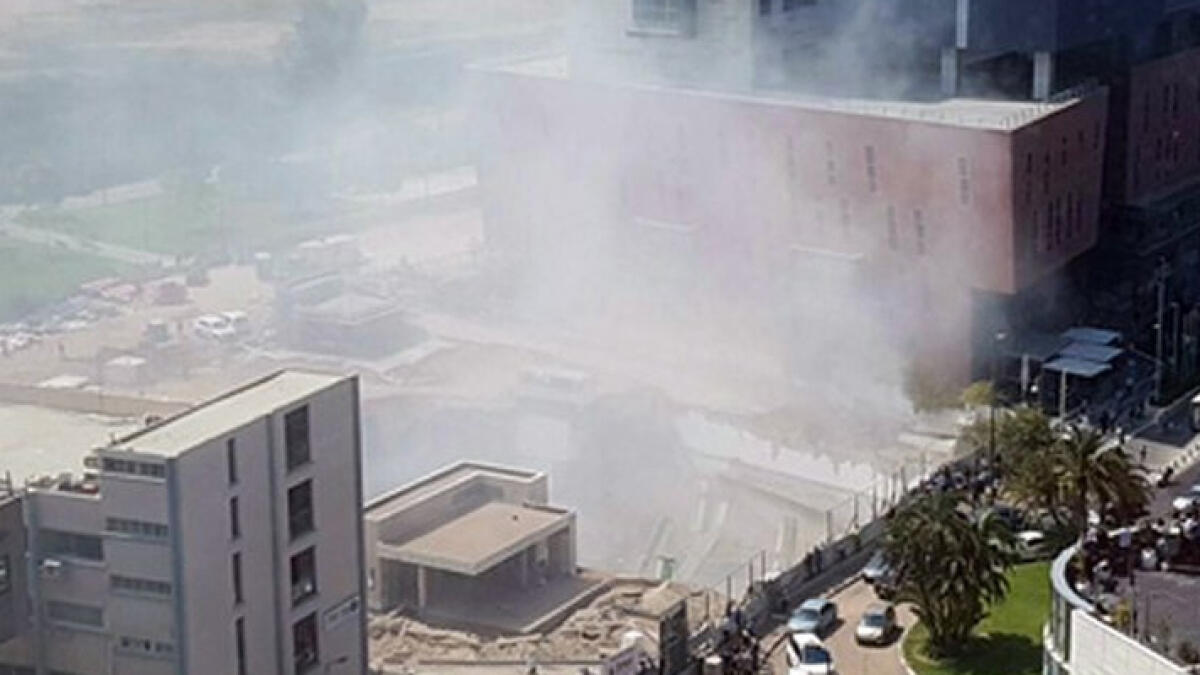 Building collapses in Tel Aviv, people may be trapped inside