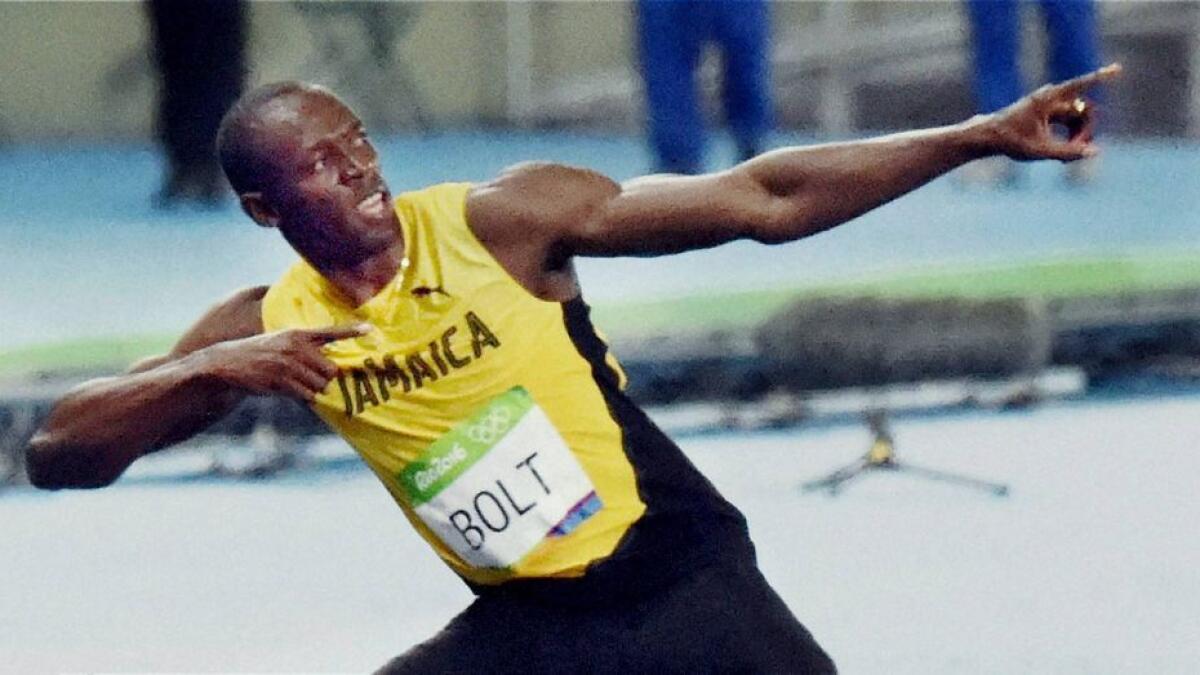 Bolt breezes to another gold