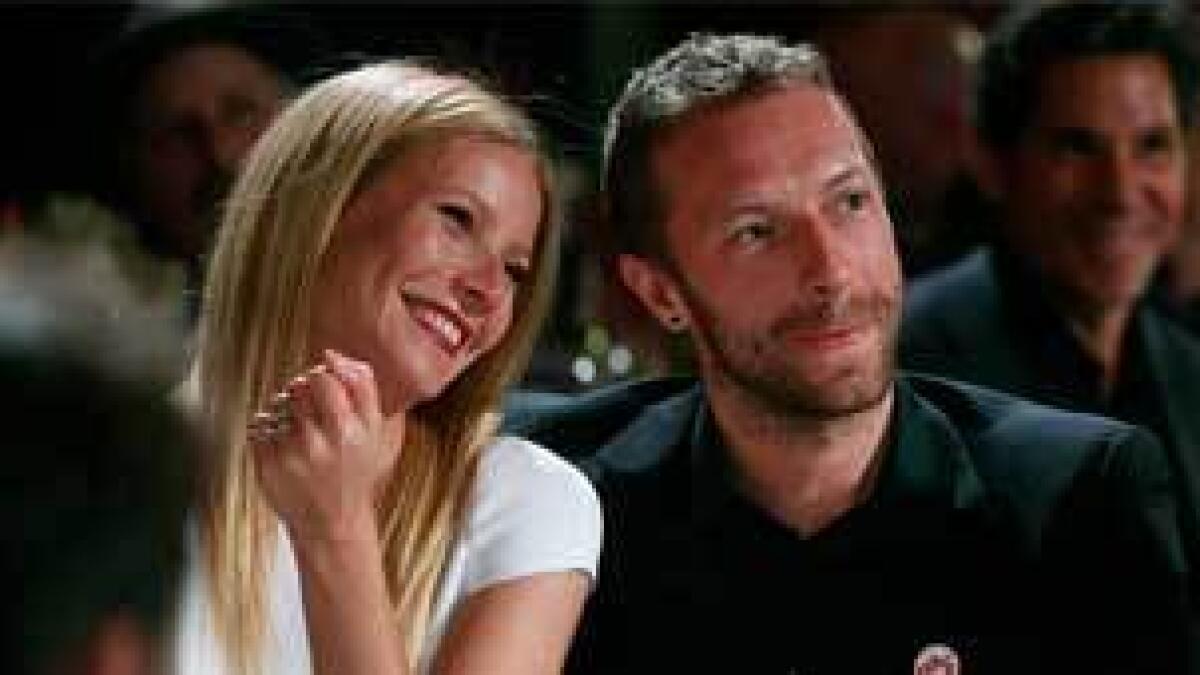 Gwyneth Paltrow and Chris Martin hang out together