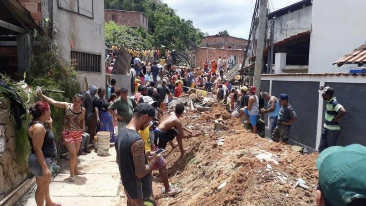 At least 10 dead, 11 injured in Rio mudslide