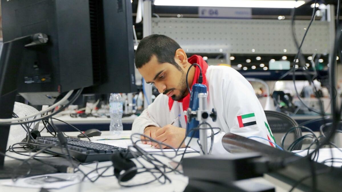 A participant engaged in his work during the ongoing WorldSkills 2017 at the Abu Dhabi National Exhibition Centre.—  Photo by Ryan Lim