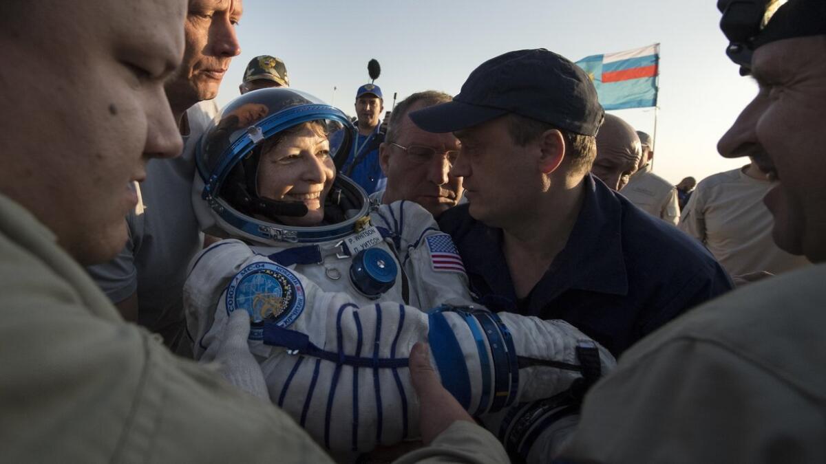  Record-breaking Nasa astronaut comes back to Earth
