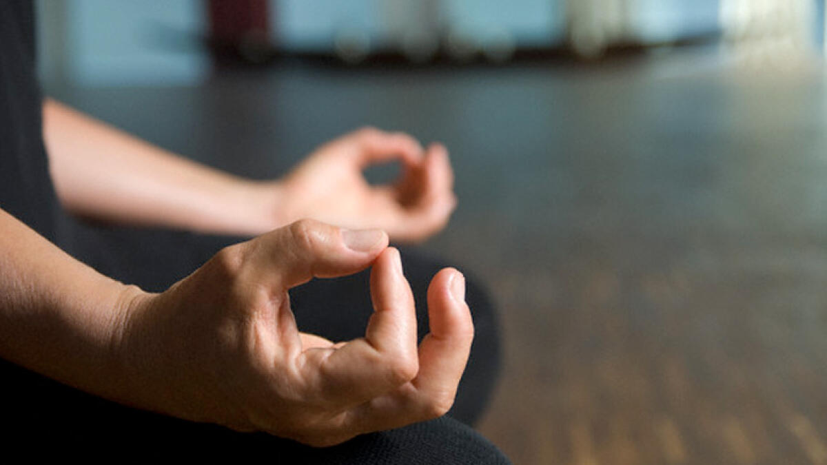 Man arrested after doing yoga on airplane