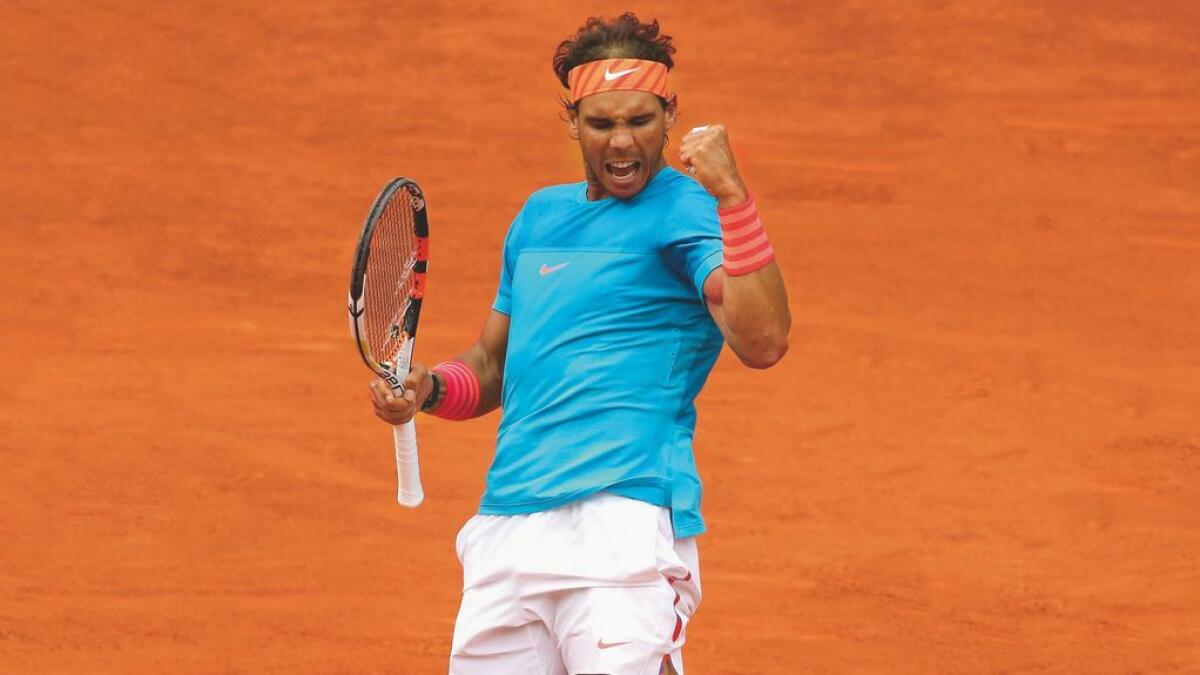 Rafael Nadal of Spain celebrates a point against Steve Johnson of the United Staes during the Mutua Madrid Open tennis tournament in Madrid, Spain, last year