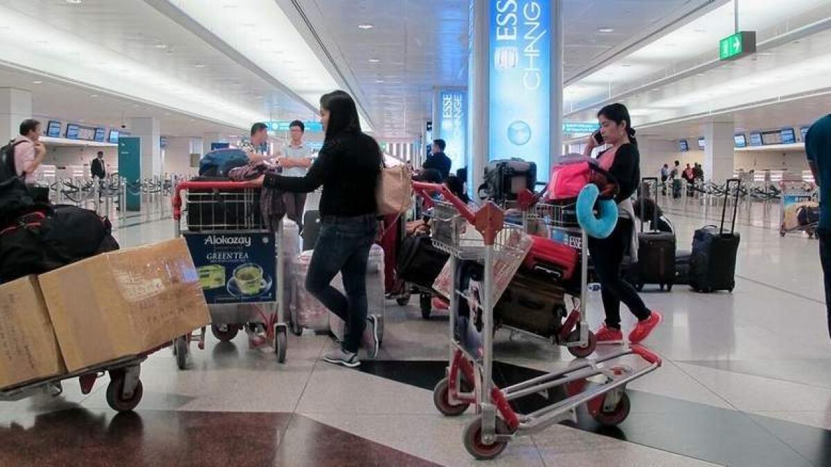 Passengers at Dubai airport.