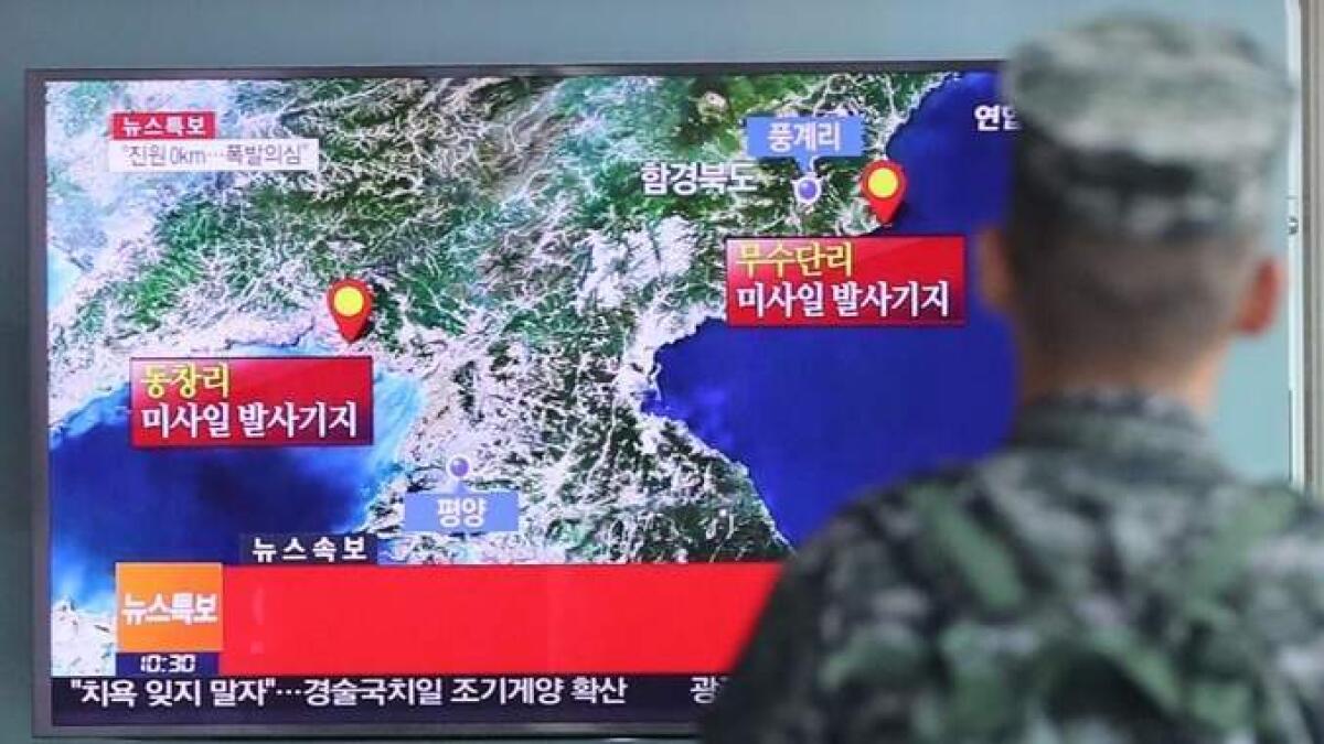 China says N.Korean quake suspected explosion, S.Korea says likely a natural quake 